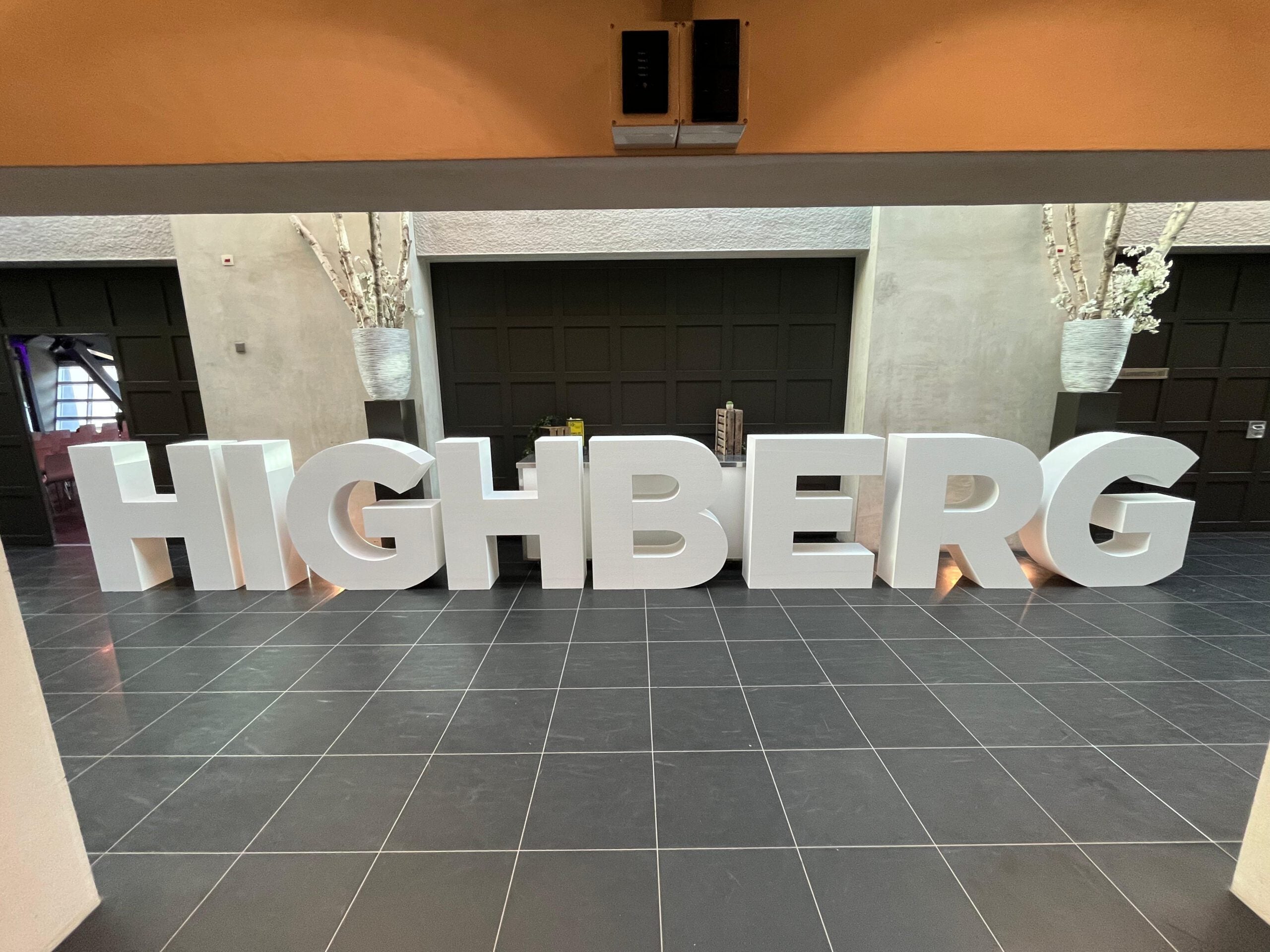 Large white letters spelling &